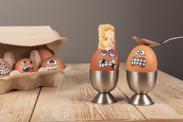 Breakfast eggs with faces 