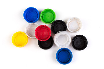 many plastic covers of different colors, isolated on white background.