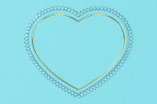 Heart-shaped frame made of small diamonds and glossy gold on turquoise textured background