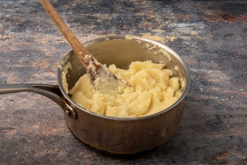 Creamy mashed potato in saucepan