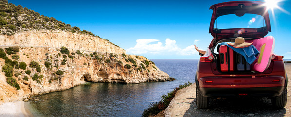 Summer car on road and sea landscape 