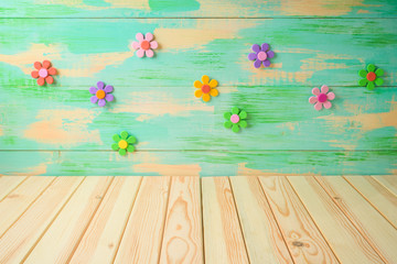 Empty wooden table over colorful background.