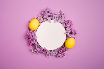 yellow Easter egg as Lily of the valley flower on purple background. minimalism, copy space