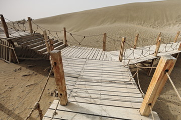 Wooden boardwalks-walkways for visiting the Rawak Stupa. Taklamakan Desert-Xinjiang-China-0039