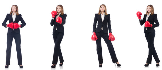Businesswoman with boxing gloves isolated on white 