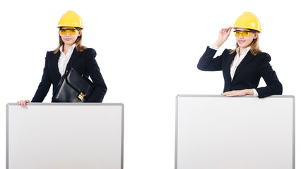 Young female builder with whiteboard 