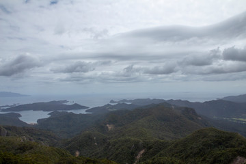 Fototapeta na wymiar Great Barrier Island: View of Harbour with Clouds