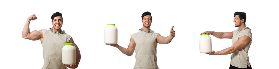 Muscular man with protein jars on white