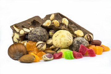 Products from chocolate, nuts, candied fruits isolated on a white background.