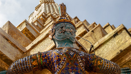 Mythical Giant and the Golden Pagoda in the Temple of Emerald Buddha, Bangkok