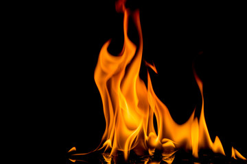 Fire flame on black background. Blaze fire flame textured background.