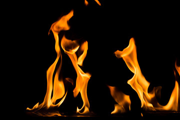 Fire flame on black background. Blaze fire flame textured background.