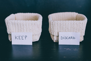 storage baskets to divide items to keep from those to declutter or donate