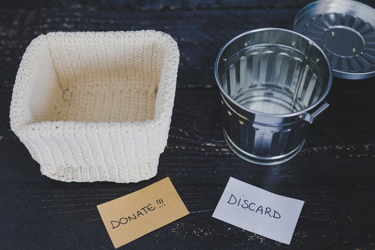 storage basket and gargabe bin to select which items to keep and which to discard, declutter concept