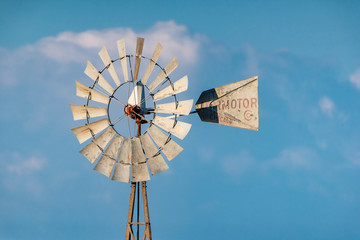 windmill against blue sky