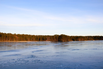 Spring sunset on frozen lake, Finland