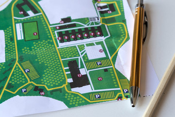 the sketch map planning and pen on the white background.