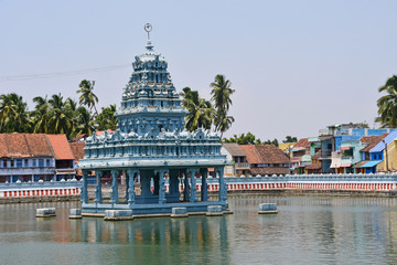 India, pond with gazebo in front of the ancient temple of Suchindram in Tamil Nadu