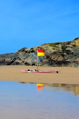 Beach Flag, Lusty Glaze Beach, Newquay, Cornwall - obrazy, fototapety, plakaty