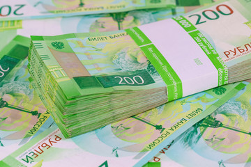 Dvuhmatchevyh bundle of banknotes in the banking package of other lies unfolded bills