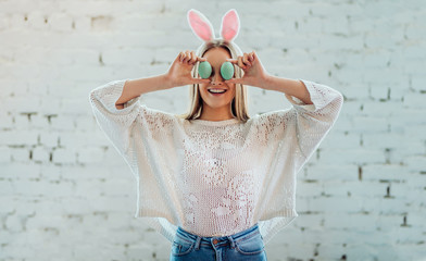I have good mood,because Easter it is my favorite holiday. Portrait of young beautiful woman with...