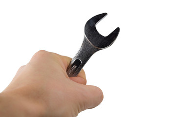 Man's hand holds a wrench isolated on white background. Close up. Repair concept