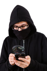 Hacker with a Magnifying Glass