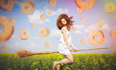 Redhead enchantress fly over spring rapeseed field at broom.