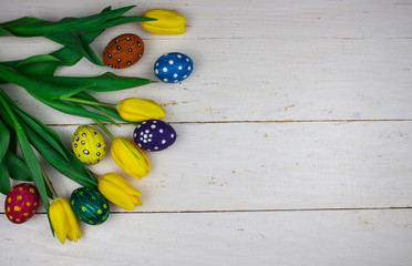 Easter eggs. Happy easter card. Multi-colored Easter eggs. Easter. Easter eggs on a white wooden background. Easter background. Easter eggs. Easter. Easter symbol. Easter card. Easter greetings. Happy