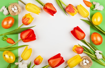 Beautiful red  tulips flowers and Easter eggs  for holiday.