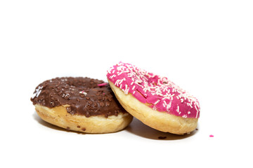 Donuts on a white background, two multi-colored donuts.