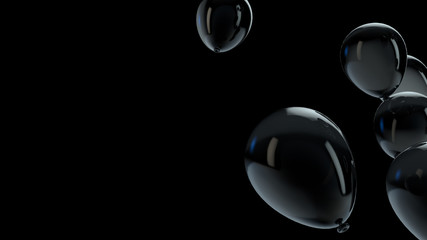 Black balloon floating in the air