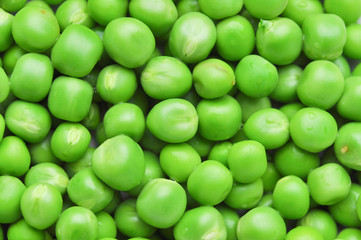 Green peas background texture.