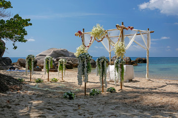 romantic wedding ceremony on the paradise tropical beach on Koh Tao, Thailand