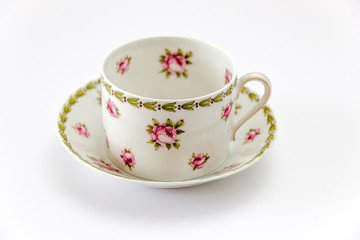 porcelain Cup, saucer and plate isolated on white background