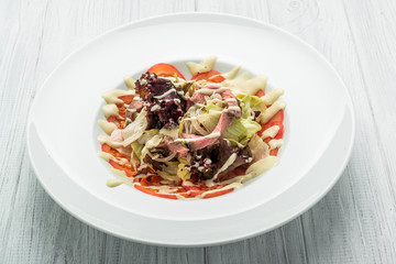 meat salad with vegetable and sesame. spanish kitchen