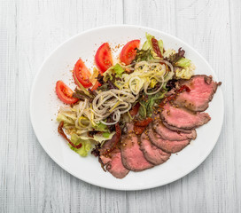 meat salad with vegetable and sesame. spanish kitchen