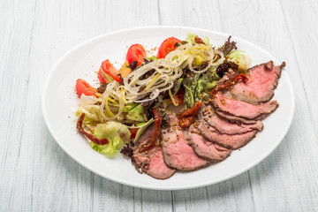 meat salad with vegetable and sesame. spanish kitchen