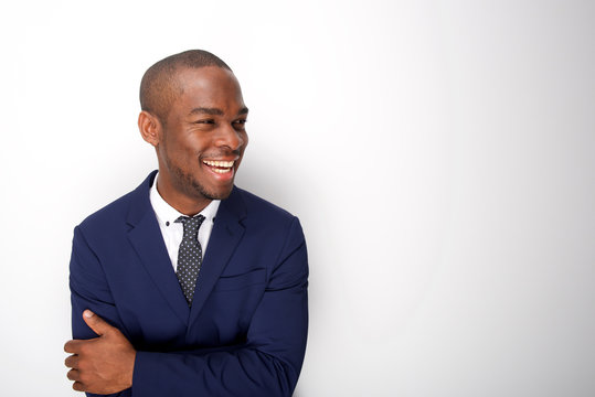 happy african american man in business suit against white background