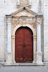Fototapeta na wymiar Old vintage red door, entrance