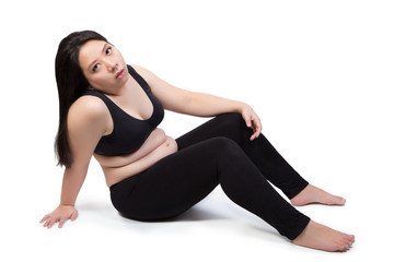 lazy fat woman bored face tired exhausted to exercise weight loss sitting on ground isolated on white background