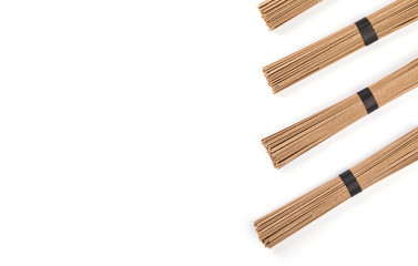 Noodles soba isolated on white background.Traditional Japanese food. Copy space for Text.Minimalist concept.Top View. Flat Lay.