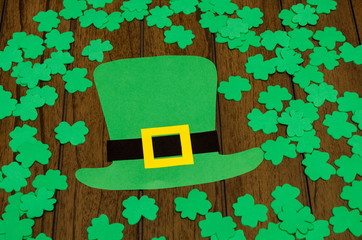 Paper Saint Patrick's day leprechaun props: green leprechaun hat and clovers as symbol of Ireland...
