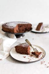 gluten free chocolate cake with slices crumbles