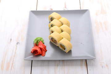 Fried sushi roll with eel and japanese omelette