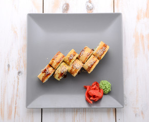 Fried sushi roll with eel and japanese omelette