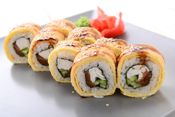Fried sushi roll with eel and japanese omelette