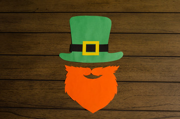 Saint Patrick's Day concept. Paper Saint Patrick's day leprechaun props: green leprechaun hat and...