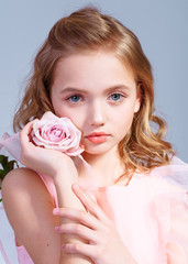 Obraz na płótnie Canvas portrait of little model girl in studio
