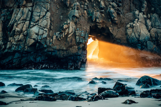 Light through key hole arch, Pfeiffer Beach, Big Sur, California